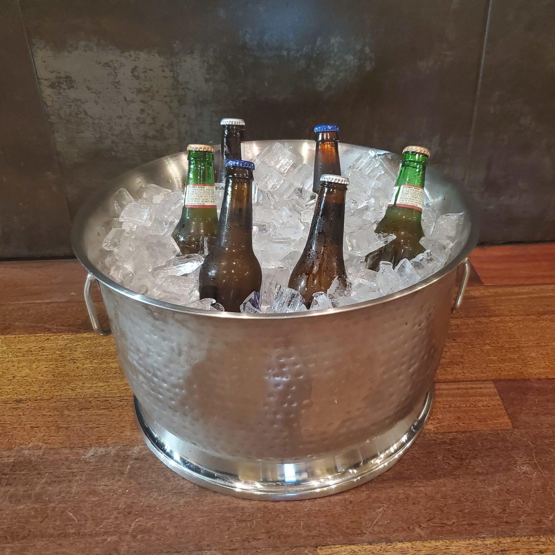Hammered Steel Bowl filled with House Beers and Ice, offered at downtown St. Pete, Florida venue NOVA 535